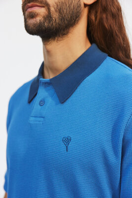 Das Oversized Retro Poloshirt von OPEN ERA