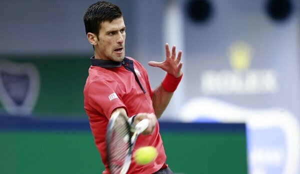 Novak Djokovic in einer Hälfte mit Stan Wawrinka und ...